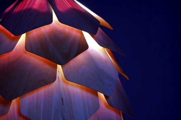 Wood Design Chandelier suspended exciting resembles a pine cone