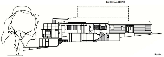 A modern residential building makes effective use of a narrow plot