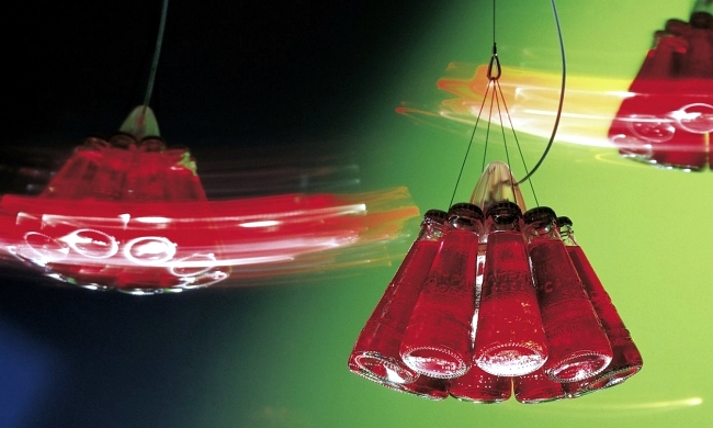 Designer table lamp Ingo Maurer Campari Bar produces light reflections