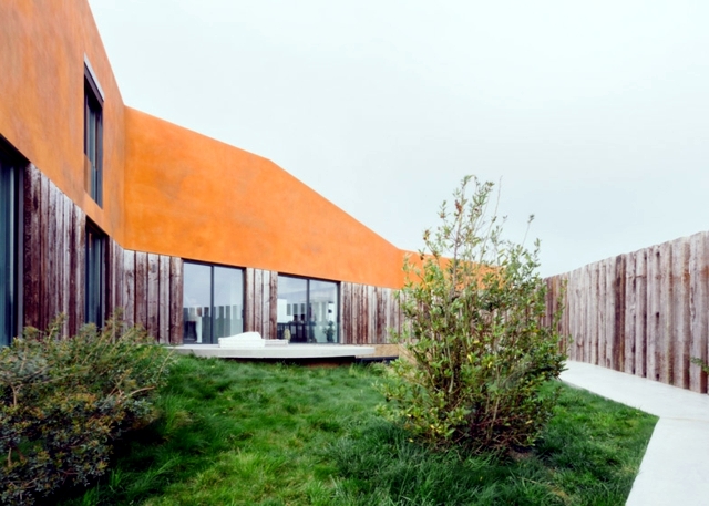 House in Portugal with copper colored paint stone