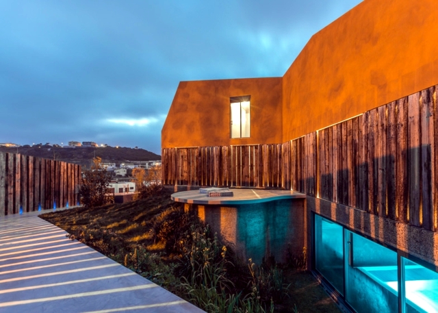 House in Portugal with copper colored paint stone