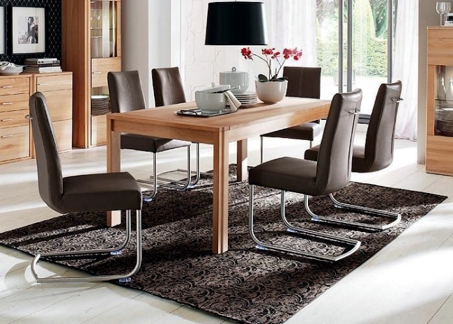 Modern dining tables solid wood provide a warm atmosphere in the room