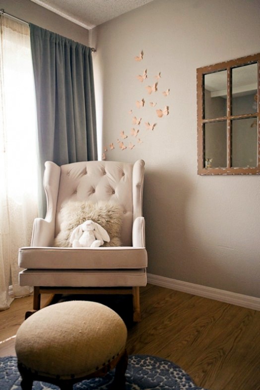 Set inside the baby's room in shades of gray and soft fishing