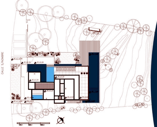 Architectural character home surrounded by loft, surrounded by greenery and water