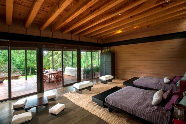 Flat roof modern wooden house in the middle of a forest of Mexico
