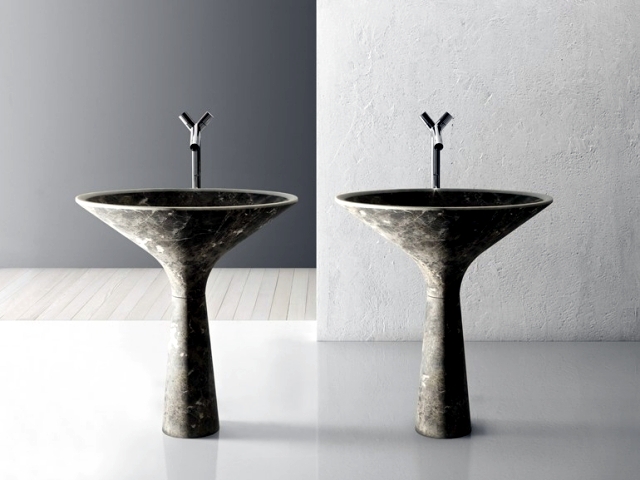 Single marble sinks, designed by Enzo Berti