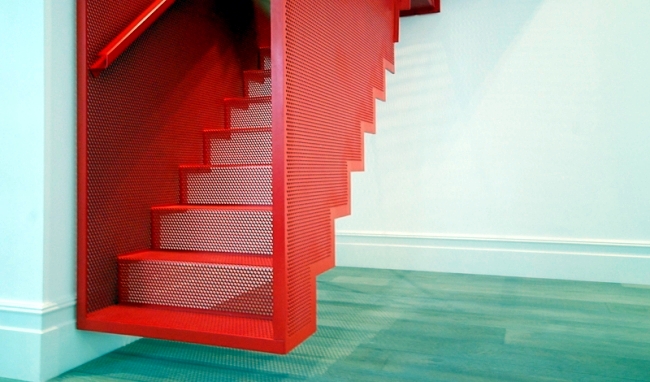 Floating staircase in bright red - and striking by Slide Design