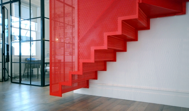 Floating staircase in bright red - and striking by Slide Design