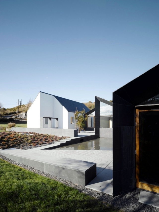 The conversion of a residential building on a rocky coastline in Ireland