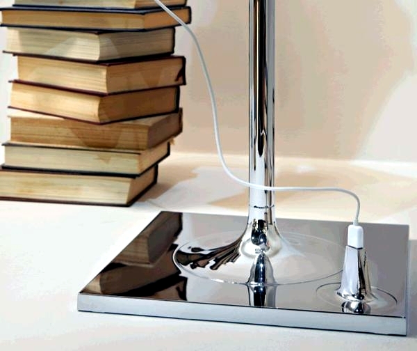 Stainless steel lamp by Philippe Starck with shelves