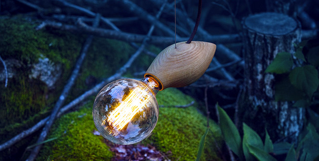 Pendant lamp modern wooden design resembles a firefly in the grass