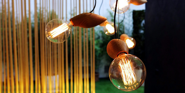 Pendant lamp modern wooden design resembles a firefly in the grass