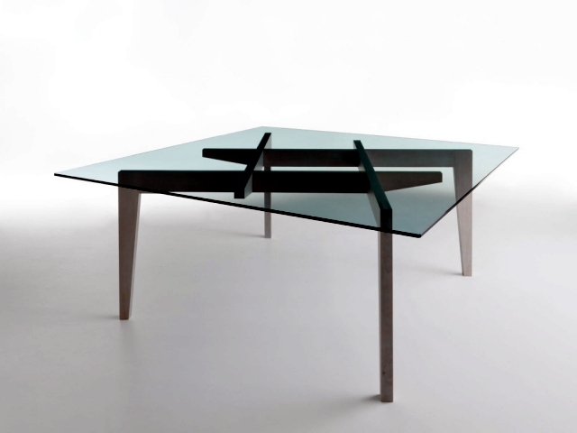 An elegant dining table design with glass and wood base Horm