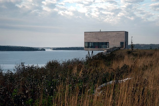 Modern wooden house on the rock on the coast of Nova Scotia