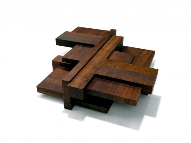 Wooden coffee table has an asymmetrical design