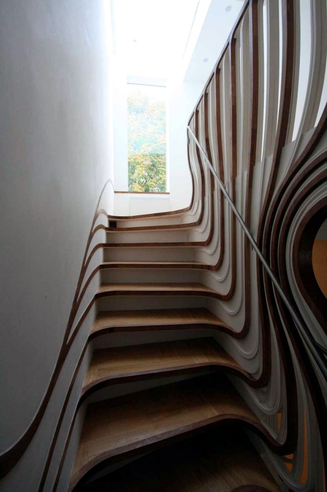 Amazing "floating" wooden staircase - designed by Atmos Studio