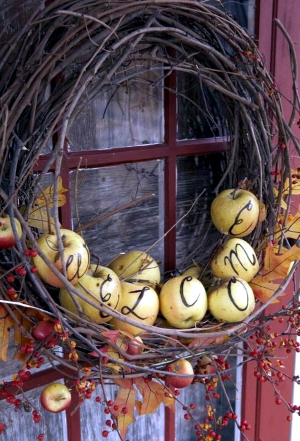 Autumnal decorating - make door wreath with apples themselves