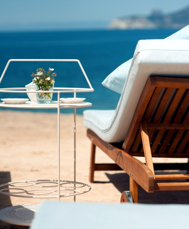 Beach in Ibiza - relax under the sun with a cocktail in hand