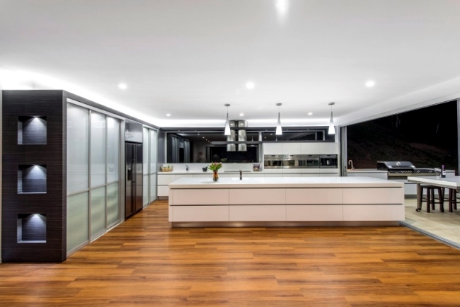Designer Corian ® kitchen with island - Modern, open and spacious