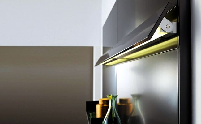 Designer stainless steel kitchen - warming gold piece from Forster