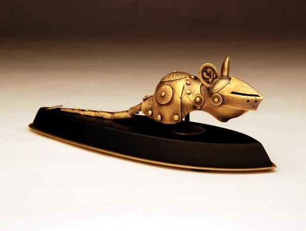 Detailed art sculptures provide armor for cats and mice represent