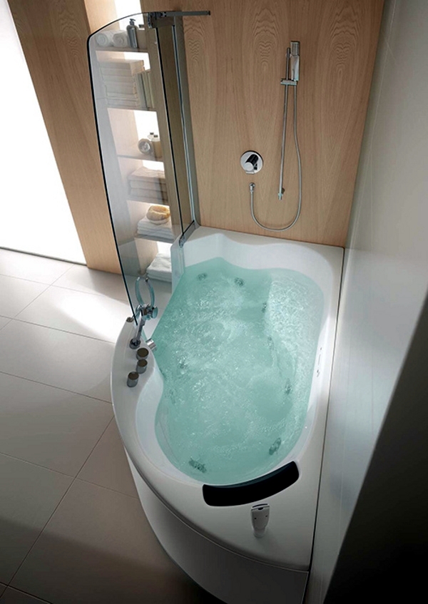 Ergonomic corner bathtub with whirlpool function by Teuco 