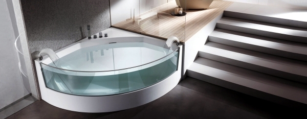 Ergonomic corner bath with shower and whirlpool function by Teuco