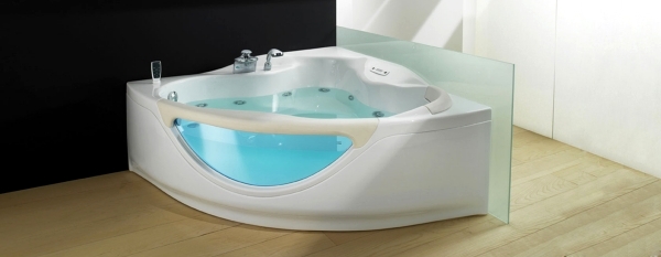 Ergonomic corner bath with shower and whirlpool function by Teuco