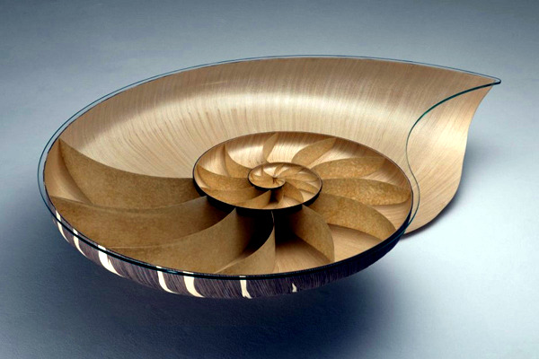 Exclusive table design in the form of a nautilus by Marc Fish