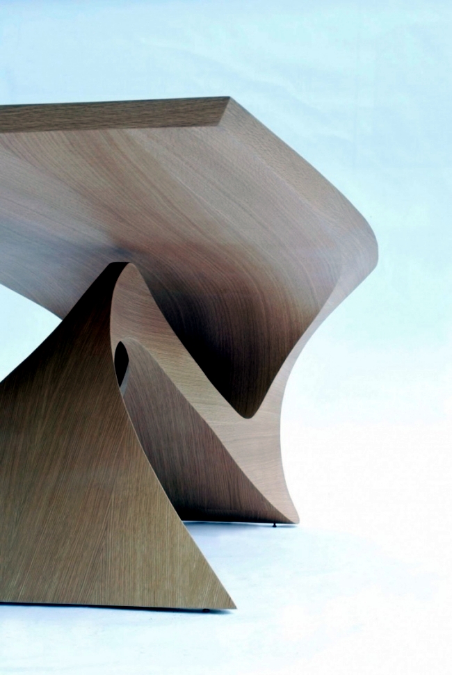 Futuristic wooden table design of the series Form Follows Function