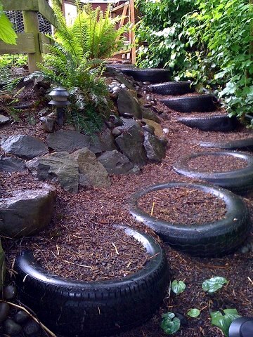Make gardening ideas with old car tire flower pots and stool itself