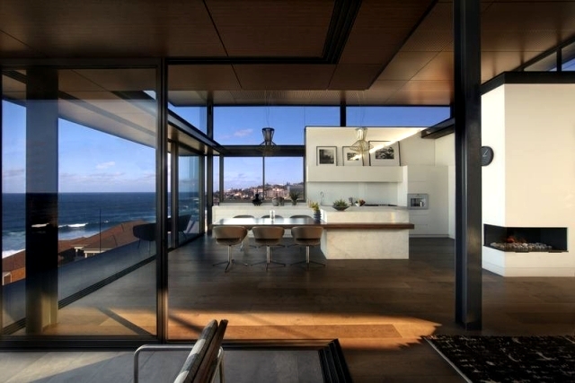 Modern beach house with glass front and a wonderful sea view