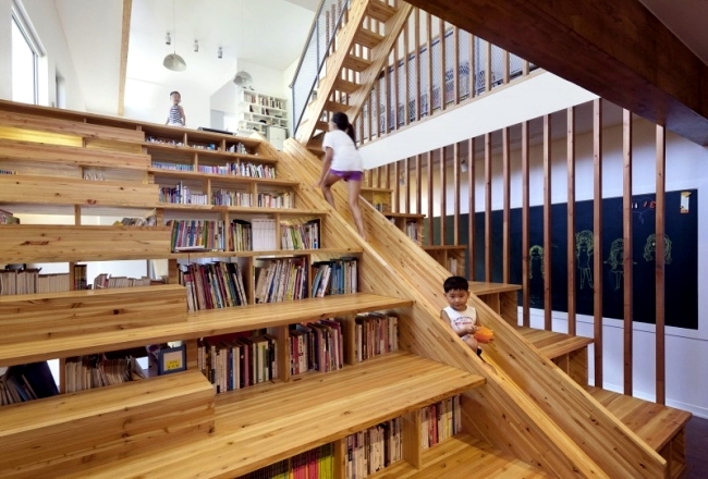Modern detached house with an interesting interior wooden staircase