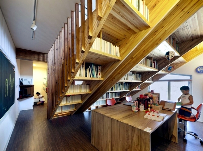Modern detached house with an interesting interior wooden staircase