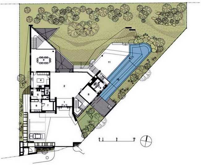 Modern House in Singapore with trapezoid shape on a triangular plot