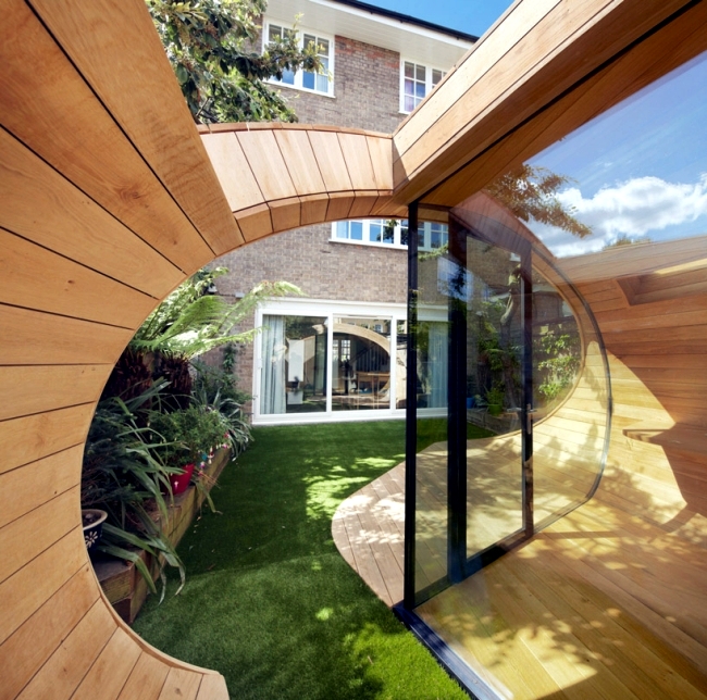 Modern wooden pavilion in the garden design will accommodate small office space
