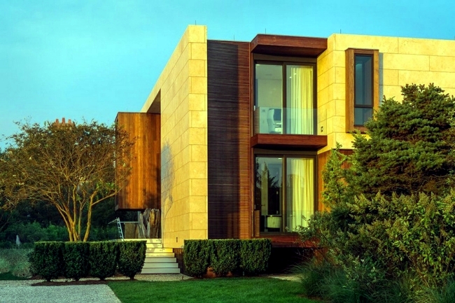 Monolithic modern villa in New York in exposed coastal location