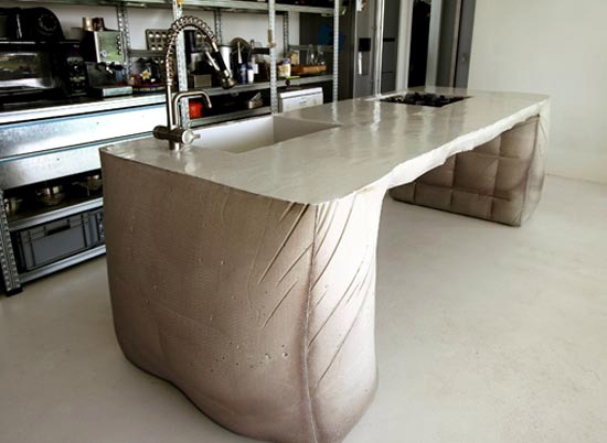 Poured concrete kitchen island - kitchen island design by Thomas Linssen