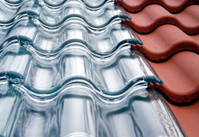 Produced tiles of glass as an effective roof system, the power