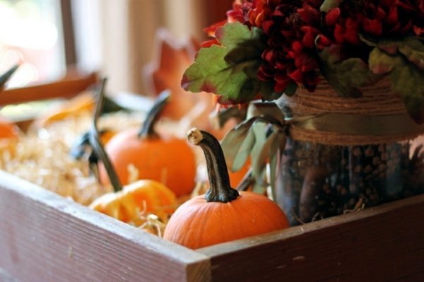 Rustic Autumn table decoration - wooden box with fruit and candles