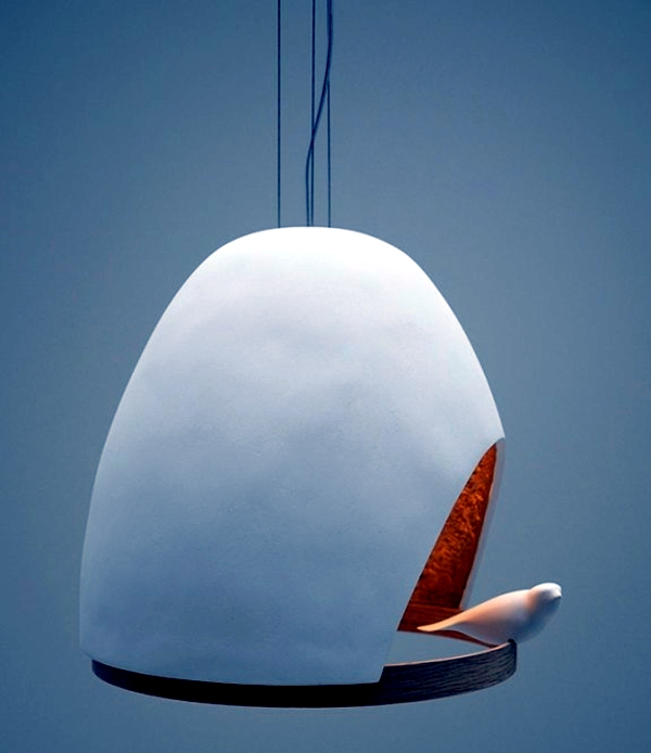 Suspension lamp made of wood makes the shape of a bird house after