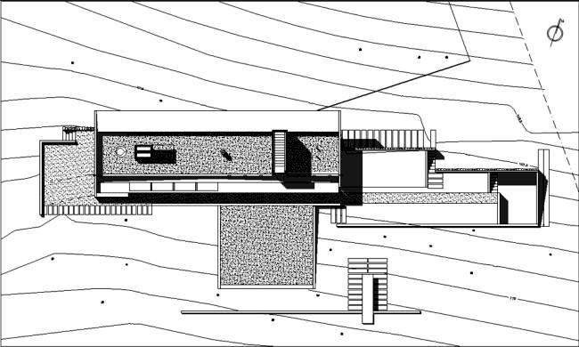 The coach house on a hillside impressed with massive concrete structure