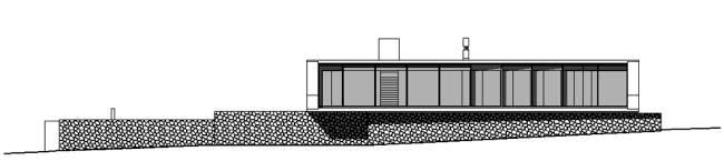 The coach house on a hillside impressed with massive concrete structure