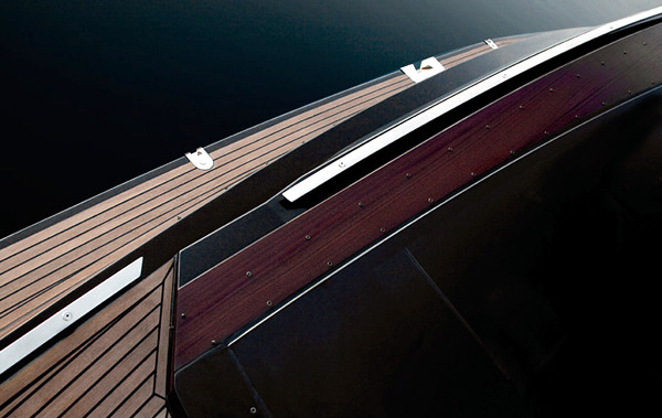 The luxury yacht by Art of Kinetik - wood tones in the interior