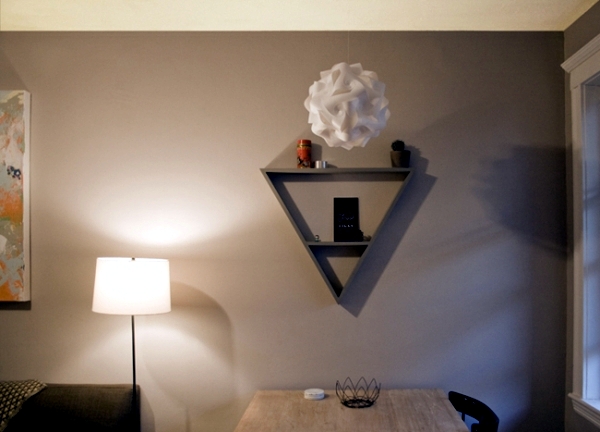 Triangle shelf build itself - practical wall decoration that offers storage space
