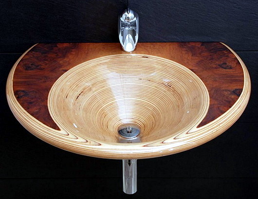 Unique sink designs in wood with elegant rounded shapes