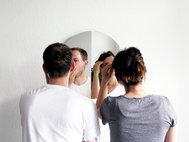 Wall mirror design allows multiple people simultaneously use